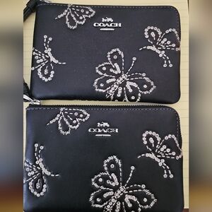 1 Coach Black Wristlet with Butterfly Embellishments PRICED TO SELL...
